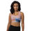 Thumbnail: Woman in pink and blue abstract print sports bra