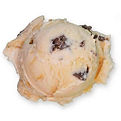 Caramel Chaos ice cream swirled with rich caramel ribbons and crunchy mix-ins.