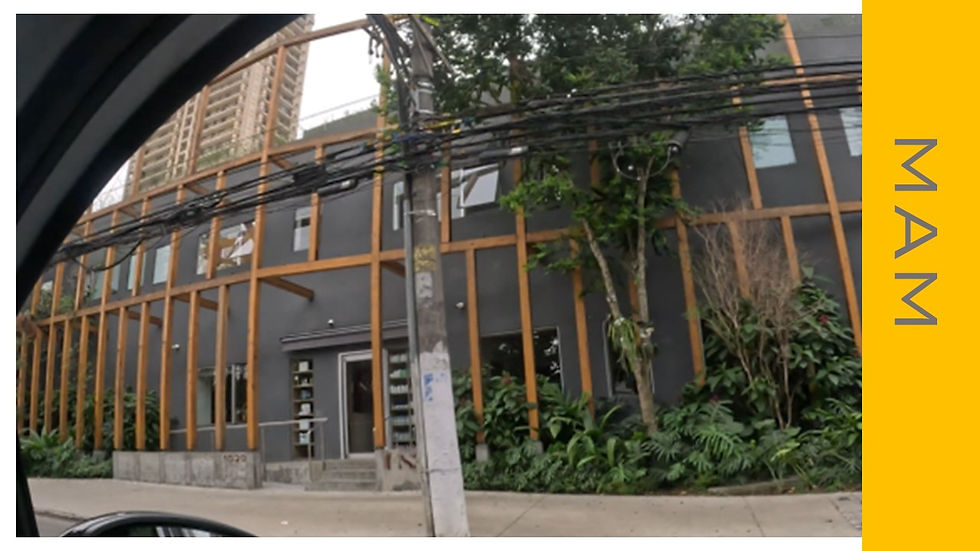 fachada comercial com aço aparente corten e textura cinza escuro