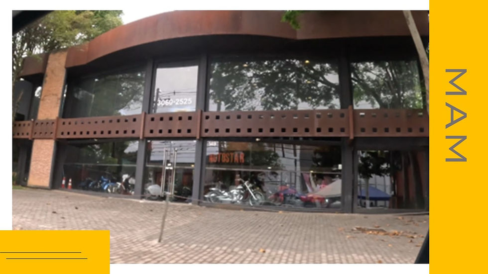 fachada comercial com aço cortem inoxidável aparente