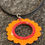 Thumbnail: Red/Orange daisy necklace (Melissa Stiles)