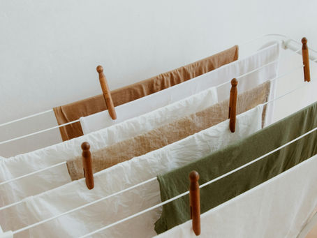 Naturally cleaned garments air-drying without chemical residue.