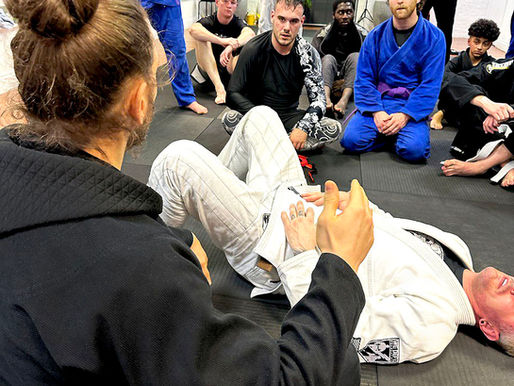 Kodokan coach leading a Brazilian Jiu-Jitsu technique class