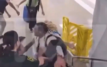Rapper Jim Jones Gets into Wild Brawl on a Florida Airport Escalator with Two Men. He Claims Self Defense.