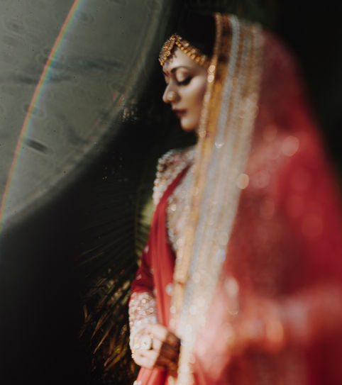 Bride showcasing her elegance and radiance in a stunning bridal portrait, capturing the joy and beauty of her wedding day