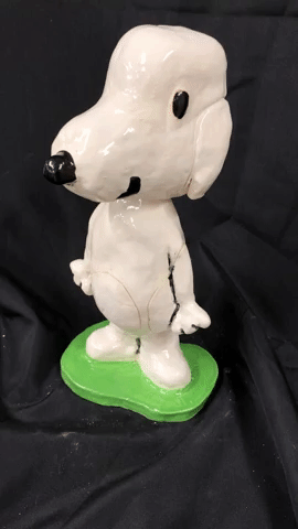 Video of student ceramic bobble head of snoopy