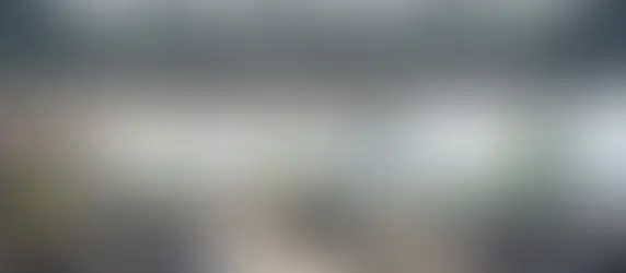 Bright Singapore office with organised desks, ergonomic furniture, indoor plants, and the visible title 'Essential Office Renovation Checklist Every Singapore Office Needs'.