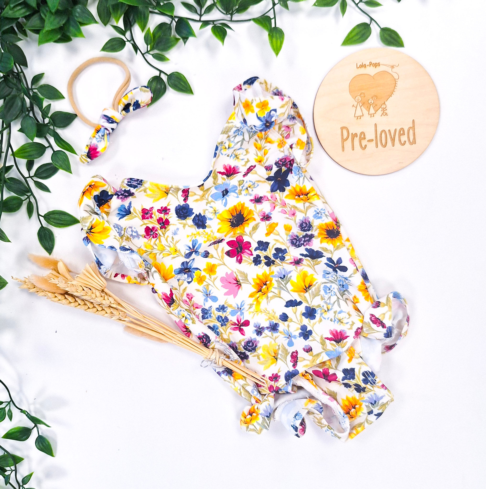 6-12m Floral frilly swimsuit