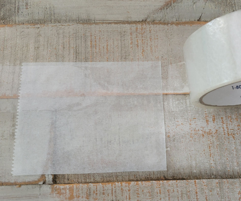 Sticking Clear Packing Tape to Parchment Paper