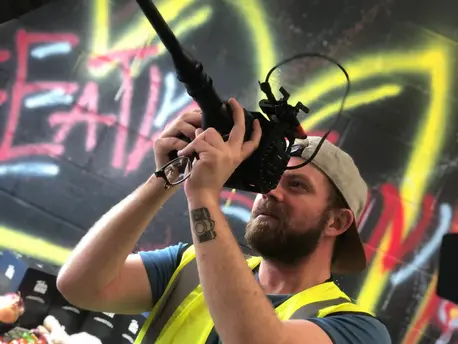 joey lever from another world media holding probe lens