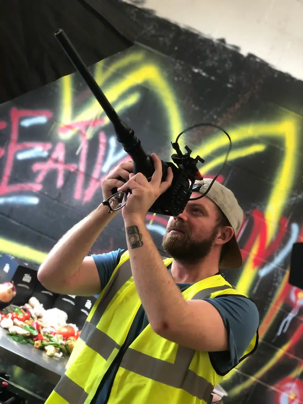 joey lever from another world media holding probe lens