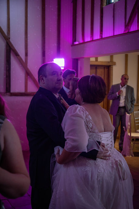 Bride and groom sharing their first dance at their Kent wedding reception
