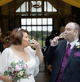 Married couple drinking champagne. Wedding Photography
