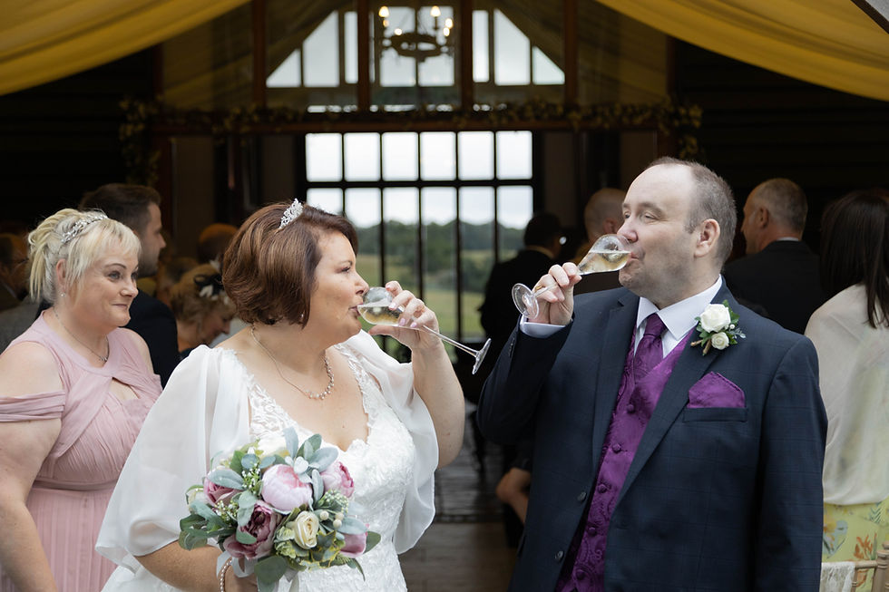 Married couple drinking champagne. Wedding Photography