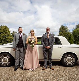Bride with family members before the ceremony at Broome Park Hotel, Canterbury, Kent.