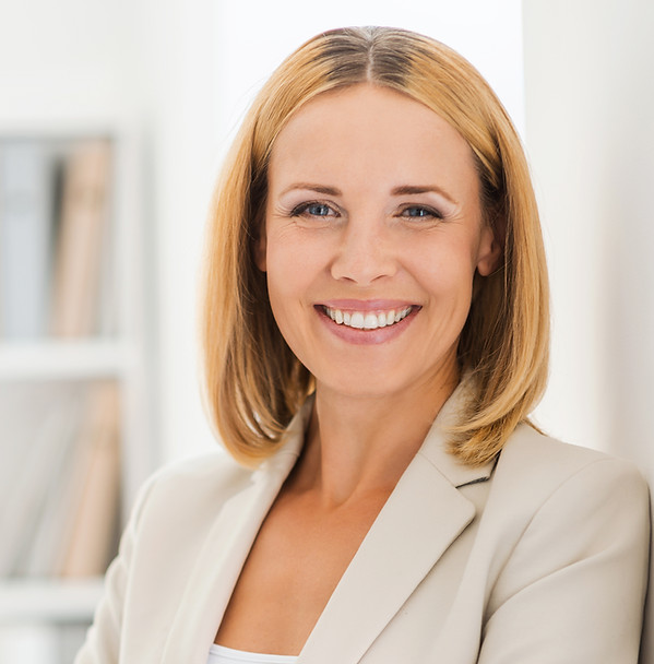 Woman Smiling in Suit