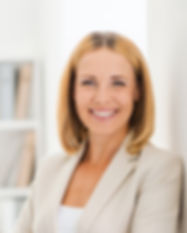 Woman Smiling in Suit