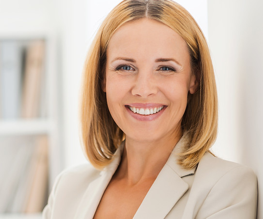 Woman Smiling in Suit