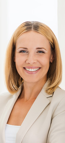 Woman Smiling in Suit