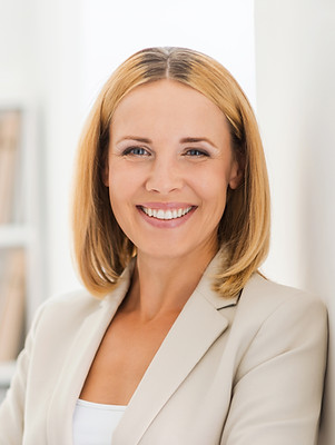 Woman Smiling in Suit
