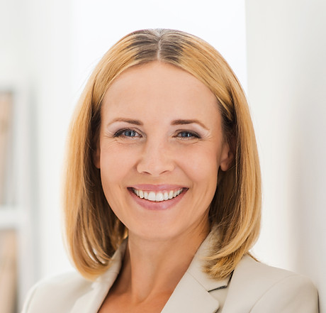 Woman Smiling in Suit