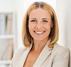 Woman Smiling in Suit