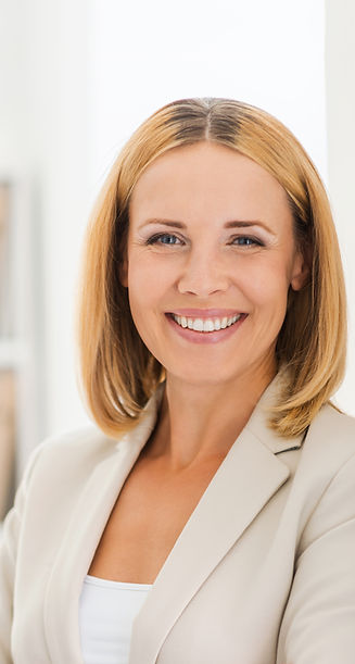 Woman Smiling in Suit
