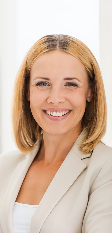 Woman Smiling in Suit