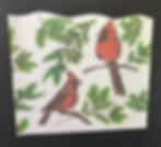 two cardinals sitting on branch