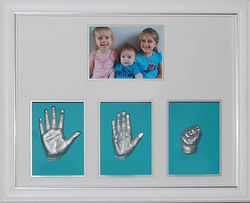 Family hands casting in frame