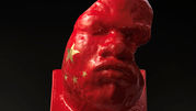 A porcelain mask by Dionisio Cimarelli, finished in red with gold stars akin to the Chinese flag, representing the fusion of Italian and Chinese cultural artistry, as highlighted in the international magazine "Tesori D'Italia - Italy" with the title "Dionisio Cimarelli: a bridge between two great civilizations".