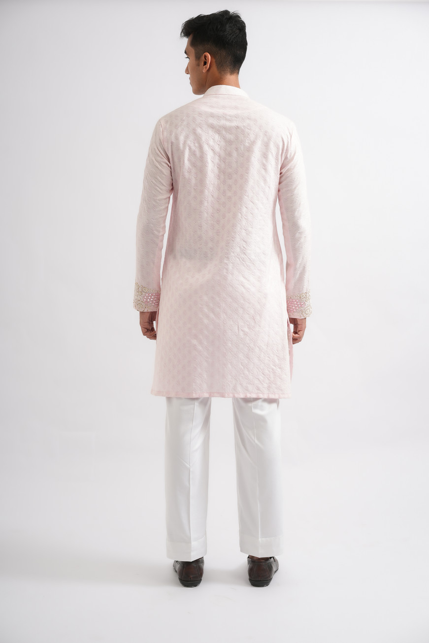 Intricate pearl resham and sequin hand embroidery on neckline of blush pink Banarasi jacquard kurta