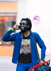 Model wearing a dark t-shirt with a grunge-style Candee design based on original studio.