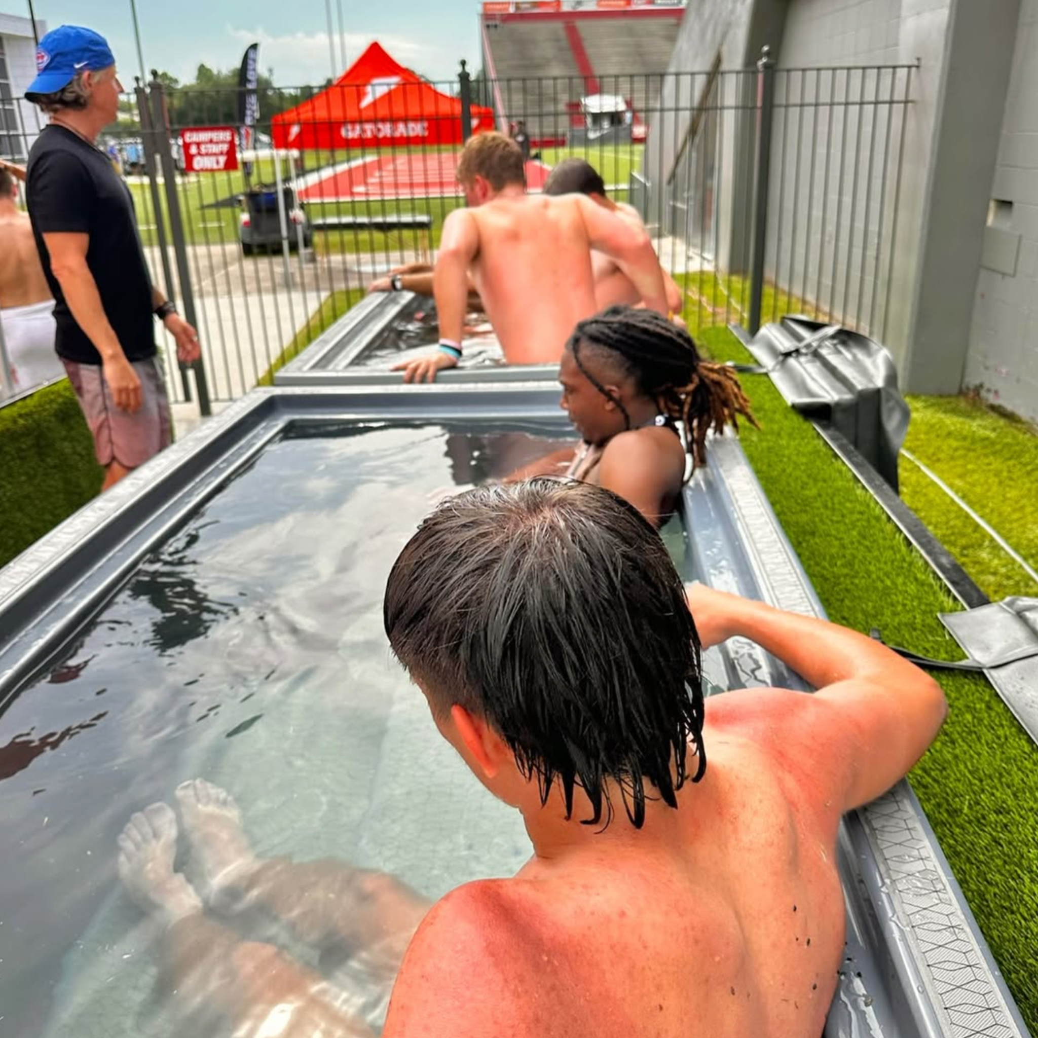 Athletes cooling down together after camp practice