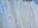 Wedding Dresses in a dress rack
