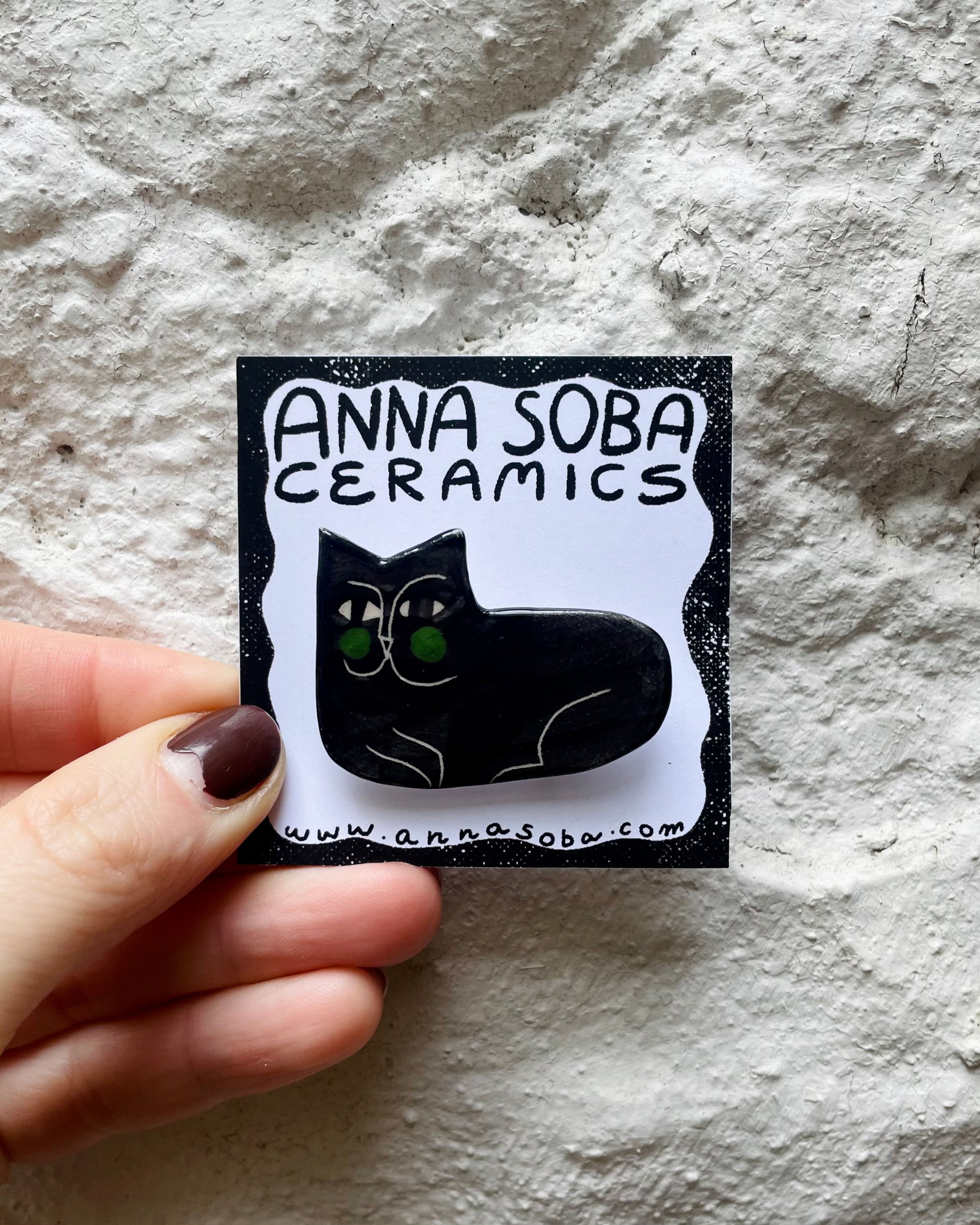 Black loaf- ceramic CAT brooch