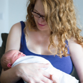 new mother holding baby