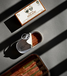 Conservas Angelachu anchovy box and open tin of Cantabrian anchovy fillets