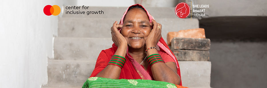 Udyam Image 1_Woman smiling with blanket copy.jpg