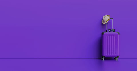 suitcase-with-hat-sunglasses-purple-background-travel-concept-with-copy-space-individual-t