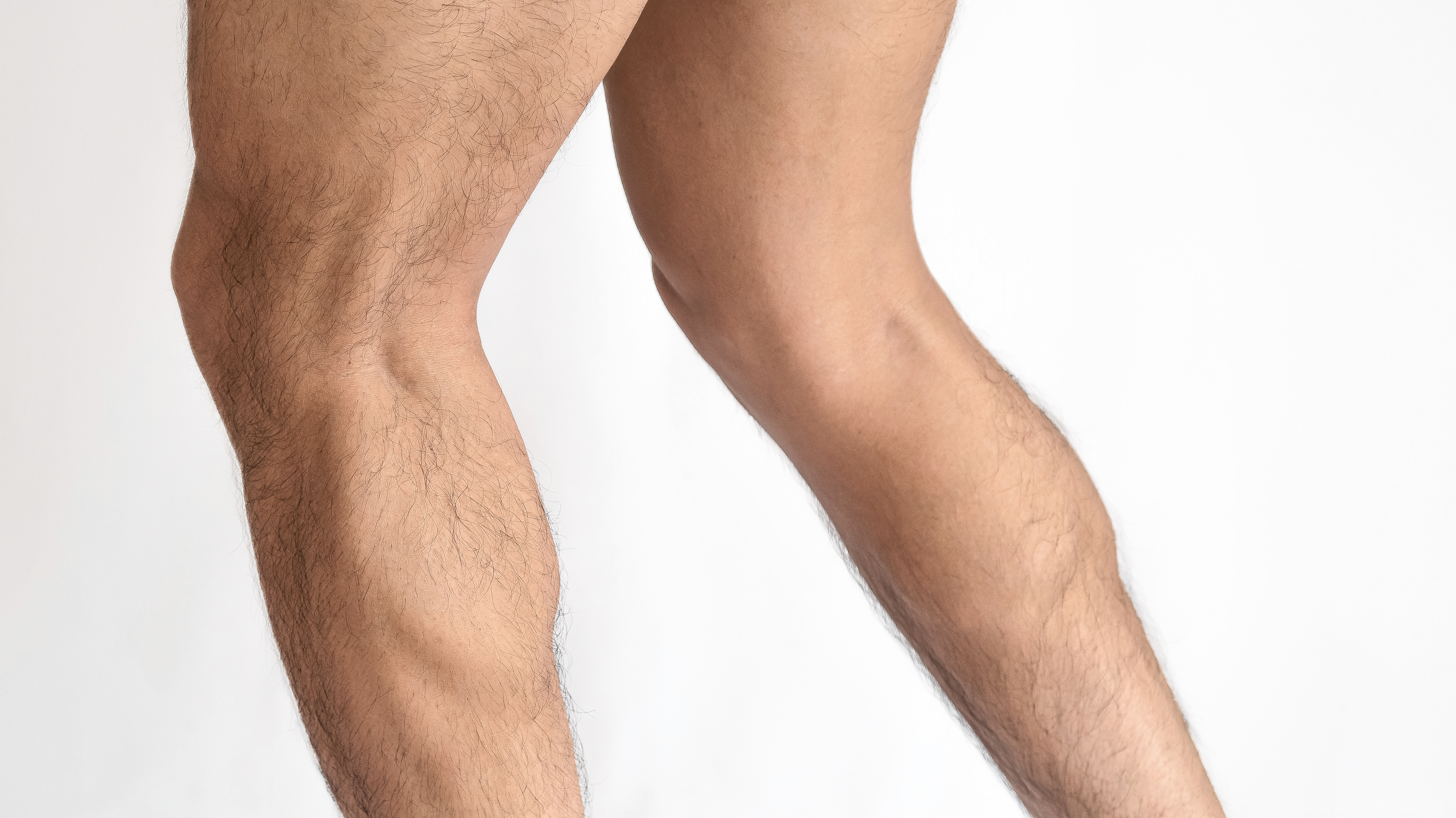 muscular-legs-of-a-man-calves-of-both-feet-seen-f-2024-04-30-21-03-21-utc.jpg