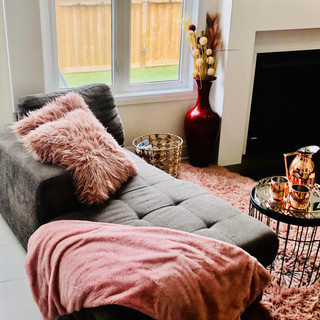 Cozy Chaise lounge by fireplace