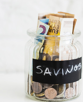 savings-glass-jar-with-euro-notes-coins-white-backdrop.jpg