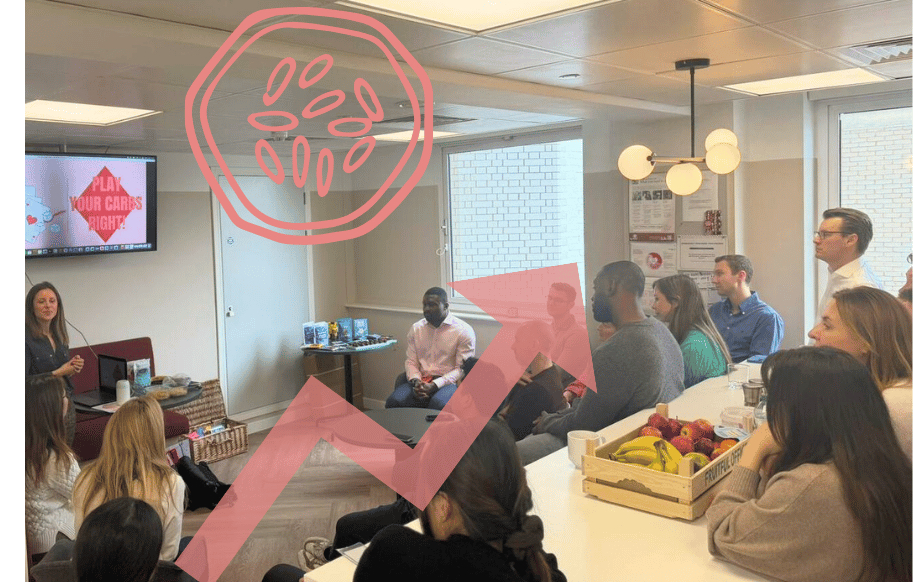 wellness speaker Steph Ley delivering an engaging wellbeing workshop to group of employees in London