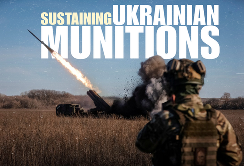 Ukrainian soldier standing next to a patriot system firing a missile defense battery