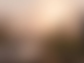 Foggy rural path at sunrise with a puddle reflecting light, symbolizing uncertainty and calm, subtle anxiety without a clear cause