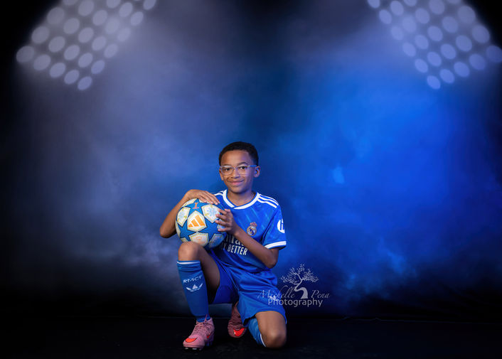Sports photography in Victoria,Texas using stadium backdrop and blue lights. 