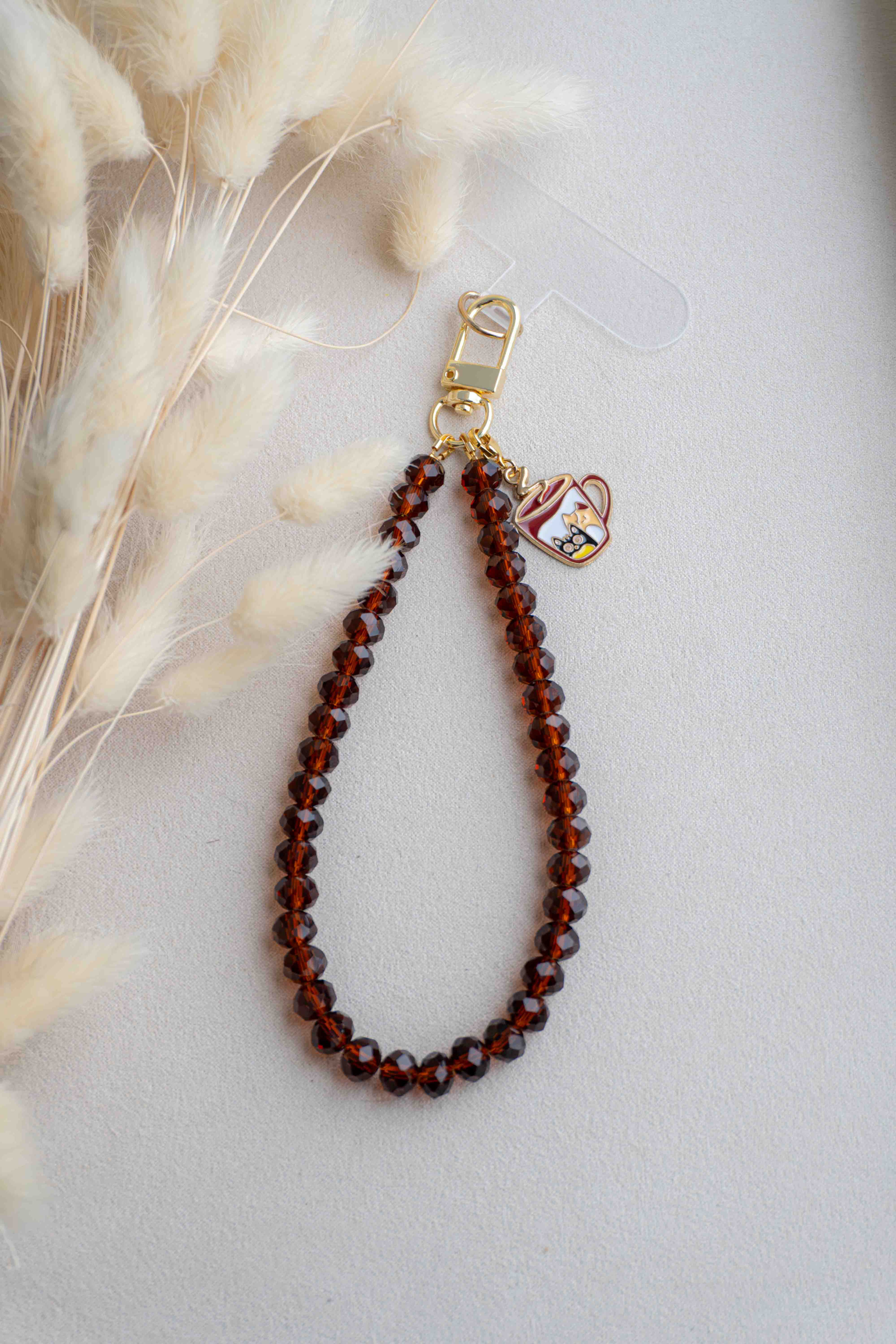 Bruine Telefoonkoord met Kitty Koffie Mok Bedel – Glazen Kralen