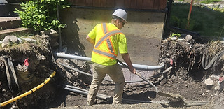Phone line install in Bragg Creek