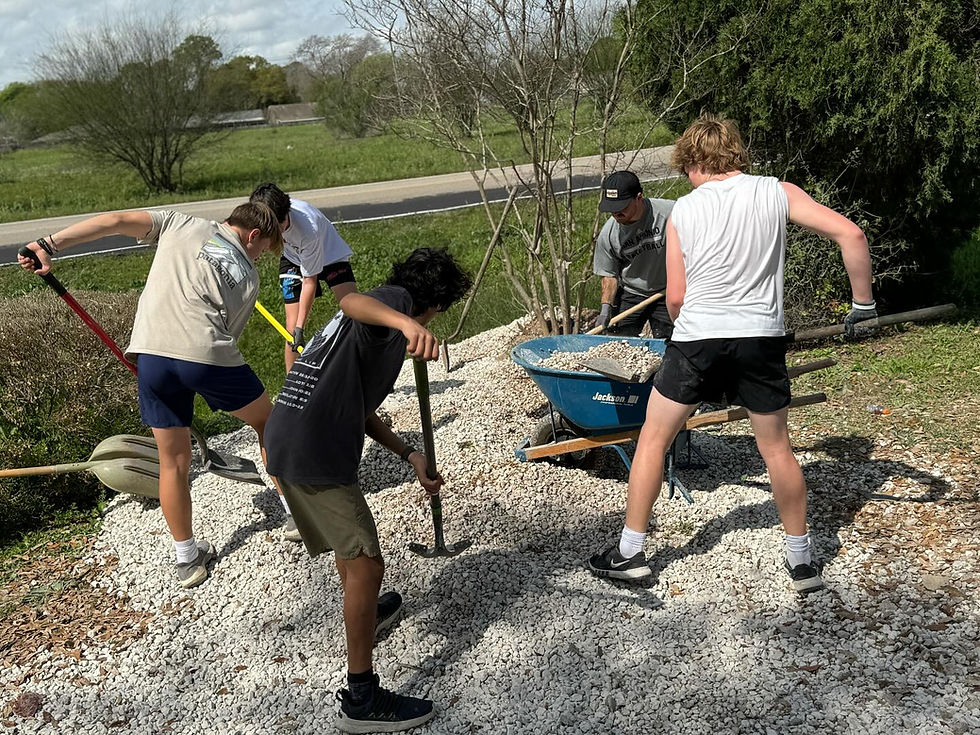 Group helping with yard work